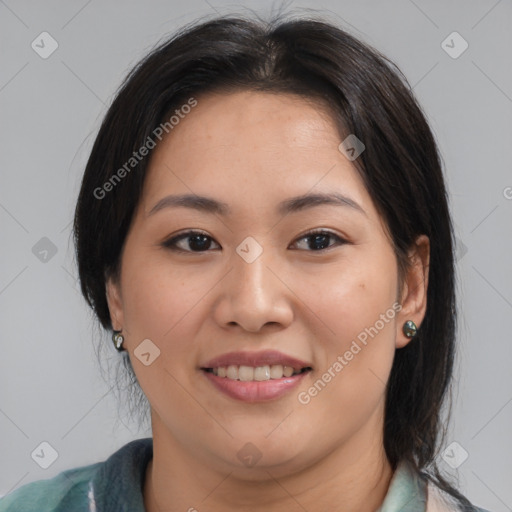 Joyful asian young-adult female with medium  brown hair and brown eyes