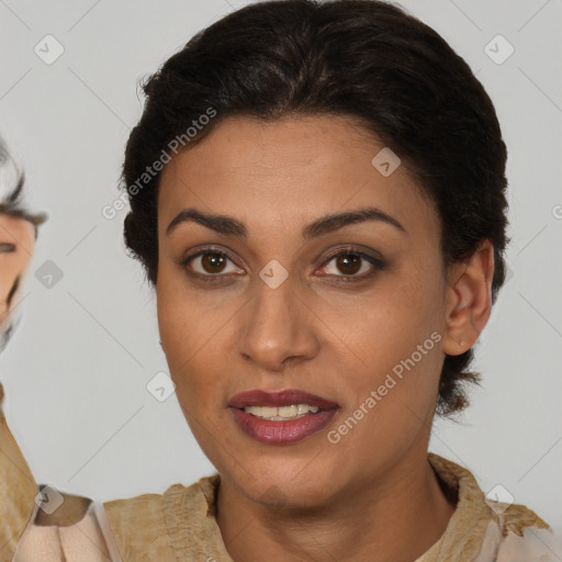 Joyful latino young-adult female with short  brown hair and brown eyes