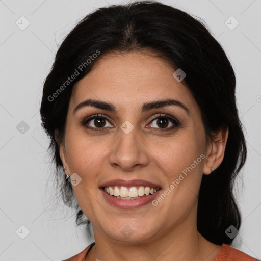 Joyful white adult female with medium  brown hair and brown eyes