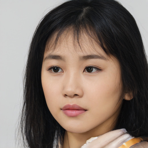 Neutral asian young-adult female with long  brown hair and brown eyes