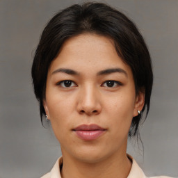 Neutral asian young-adult female with medium  brown hair and brown eyes