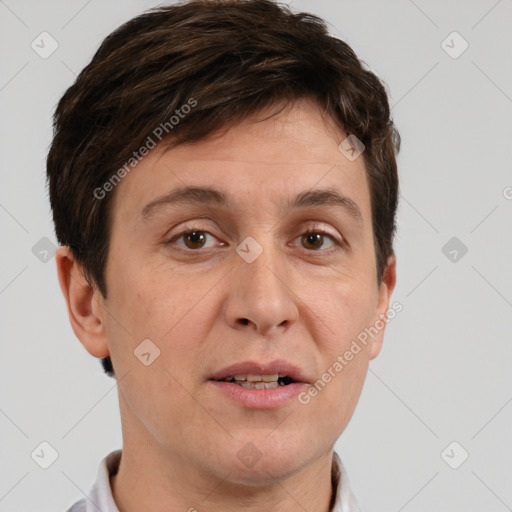 Joyful white adult male with short  brown hair and brown eyes