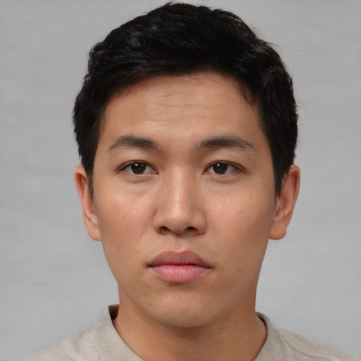 Neutral asian young-adult male with short  brown hair and brown eyes