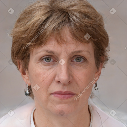 Joyful white adult female with medium  brown hair and grey eyes