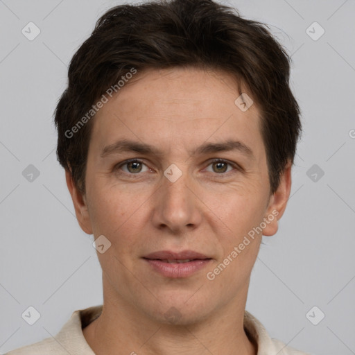 Joyful white adult male with short  brown hair and grey eyes