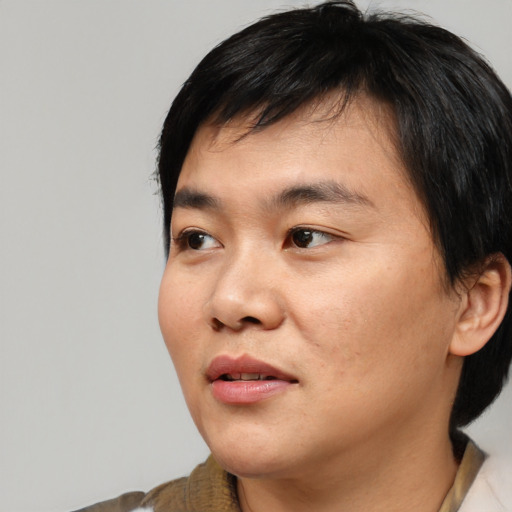 Neutral asian young-adult male with short  black hair and brown eyes
