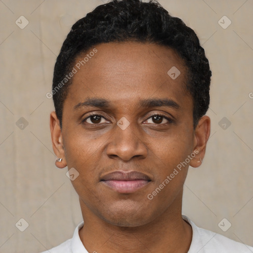 Joyful black young-adult male with short  black hair and brown eyes