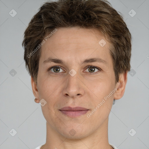 Joyful white adult male with short  brown hair and grey eyes