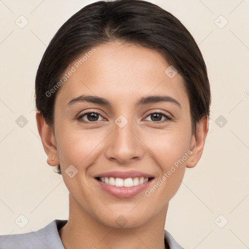 Joyful white young-adult female with short  brown hair and brown eyes