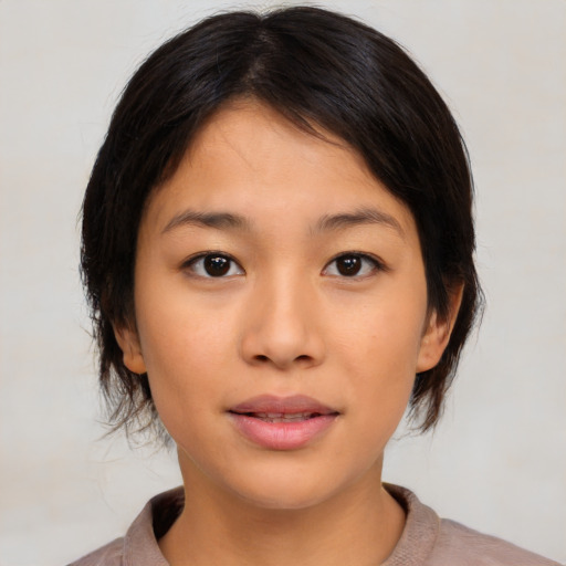 Neutral latino young-adult female with medium  brown hair and brown eyes
