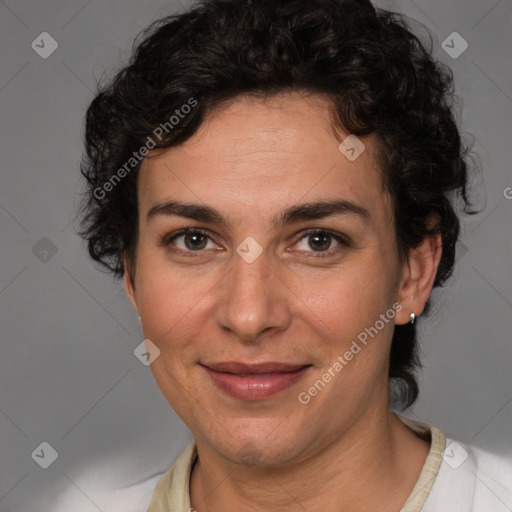 Joyful white adult female with short  brown hair and brown eyes