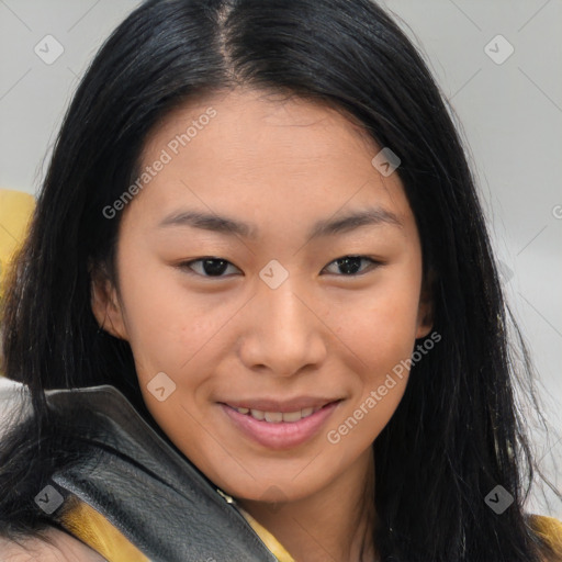 Joyful asian young-adult female with long  brown hair and brown eyes