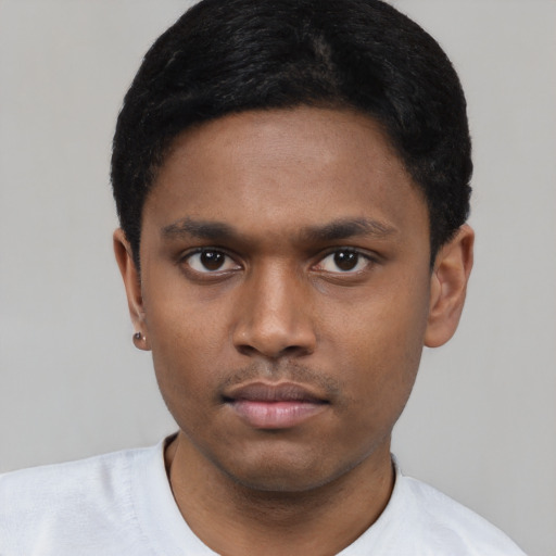 Neutral black young-adult male with short  black hair and brown eyes