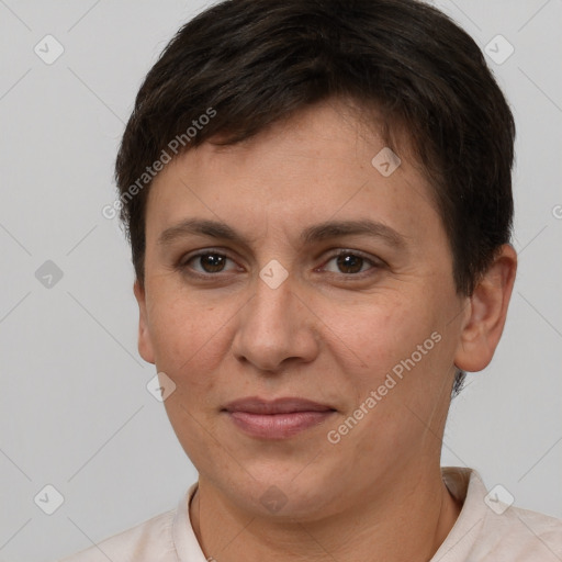 Joyful white adult female with short  brown hair and brown eyes