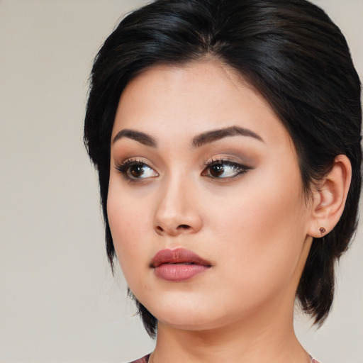 Neutral white young-adult female with medium  black hair and brown eyes