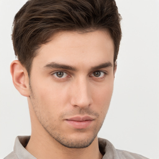 Neutral white young-adult male with short  brown hair and brown eyes