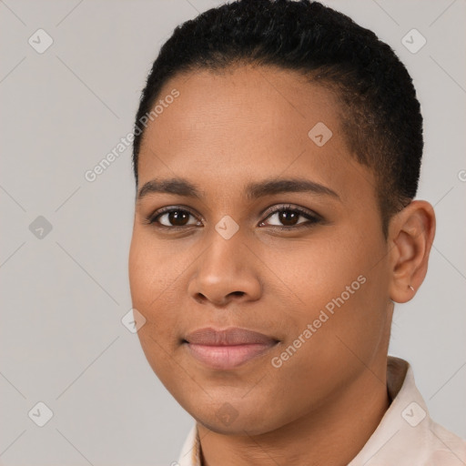 Joyful black young-adult female with short  brown hair and brown eyes