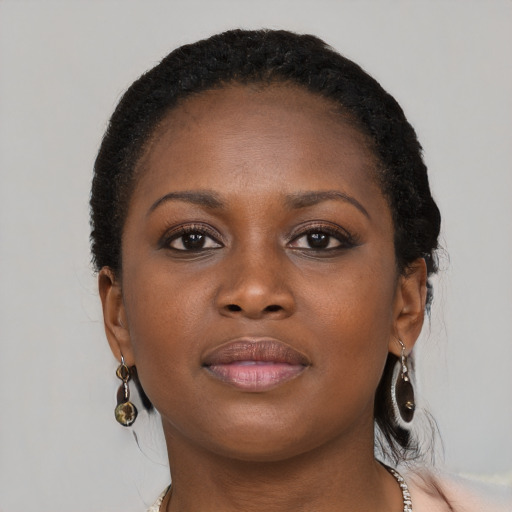 Neutral black young-adult female with long  brown hair and brown eyes