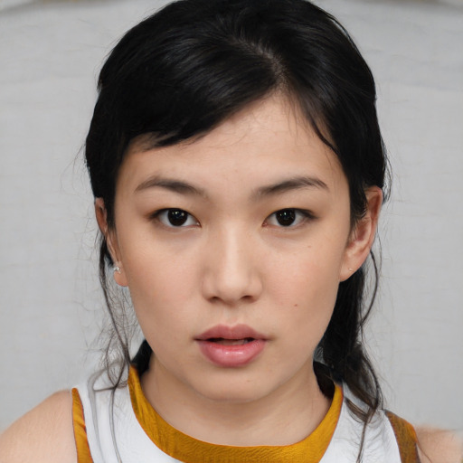 Neutral asian young-adult female with medium  black hair and brown eyes