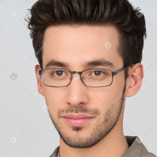 Neutral white young-adult male with short  brown hair and brown eyes