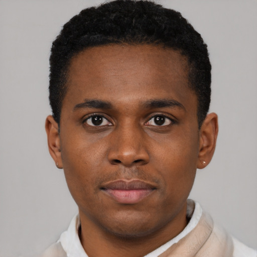 Neutral black young-adult male with short  black hair and brown eyes