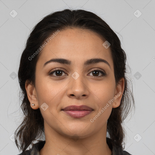 Joyful latino young-adult female with medium  brown hair and brown eyes