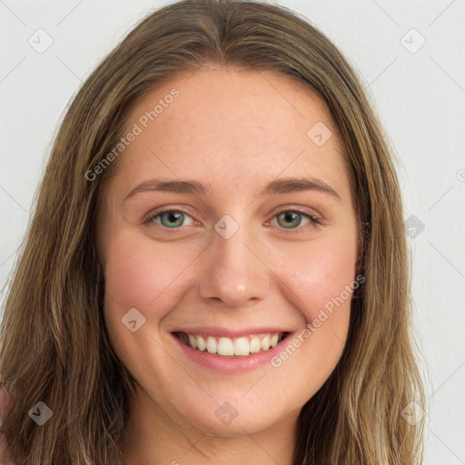 Joyful white young-adult female with long  brown hair and green eyes