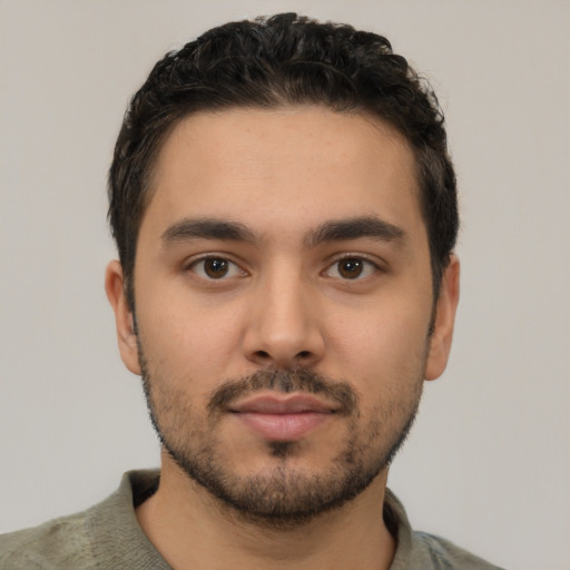 Neutral latino young-adult male with short  black hair and brown eyes