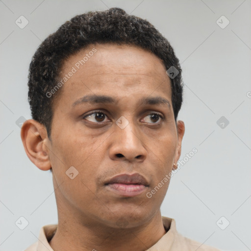 Neutral latino young-adult male with short  brown hair and brown eyes