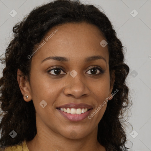 Joyful black young-adult female with long  brown hair and brown eyes