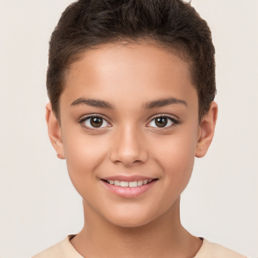 Joyful white child female with short  brown hair and brown eyes