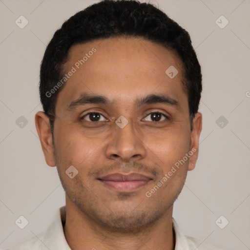 Joyful latino young-adult male with short  black hair and brown eyes