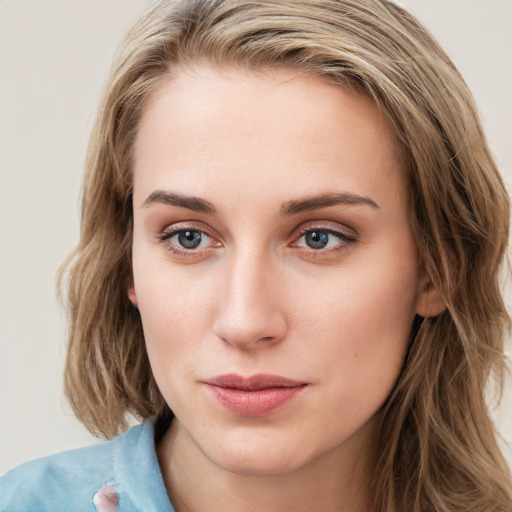 Neutral white young-adult female with long  brown hair and blue eyes