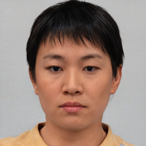 Neutral asian young-adult female with short  brown hair and brown eyes