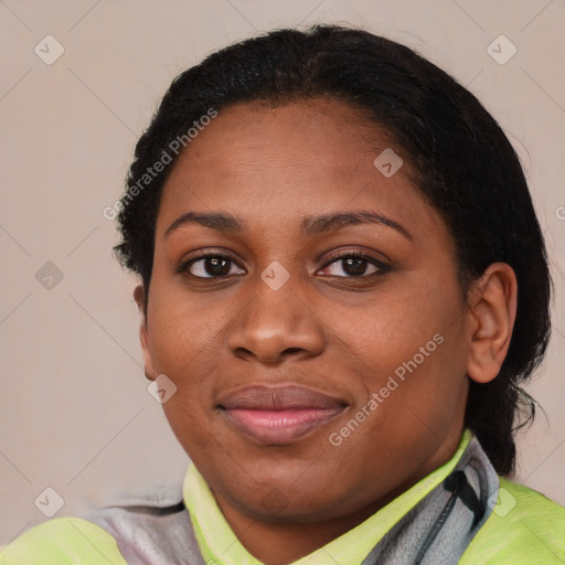 Joyful latino young-adult female with medium  black hair and brown eyes