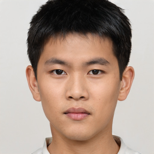 Neutral asian young-adult male with short  brown hair and brown eyes