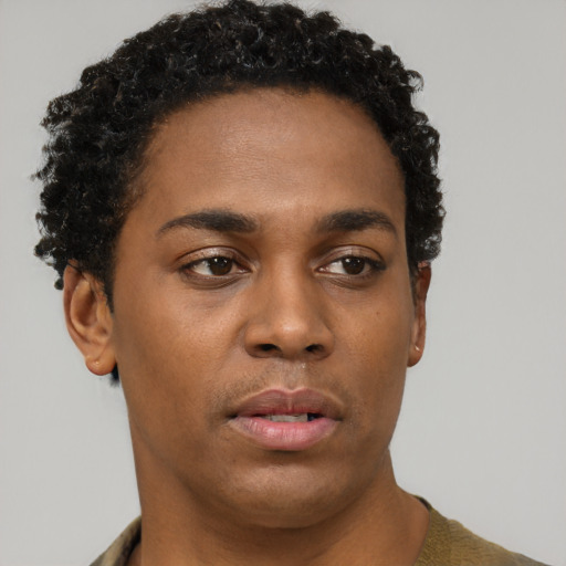 Neutral black young-adult male with short  brown hair and brown eyes
