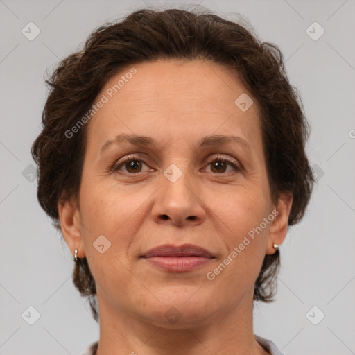 Joyful white adult female with short  brown hair and brown eyes