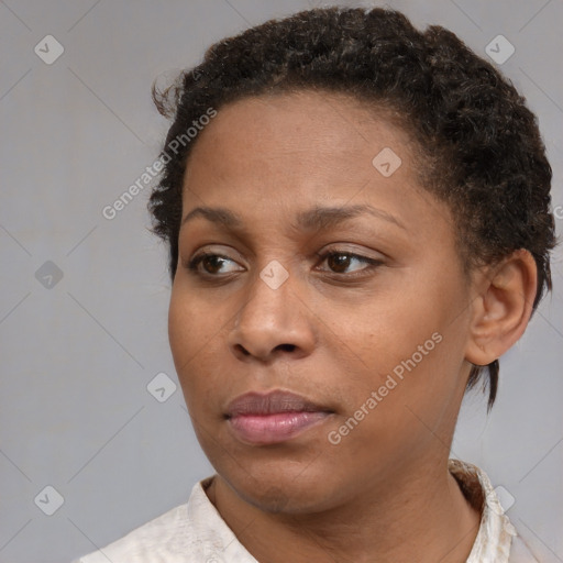 Neutral black young-adult female with short  brown hair and brown eyes