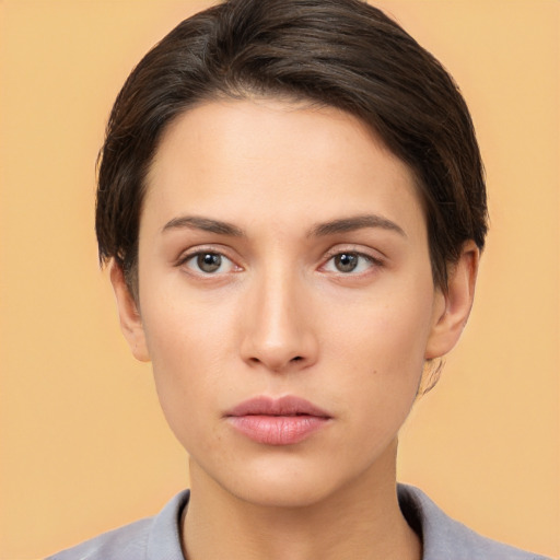 Neutral white young-adult female with short  brown hair and brown eyes