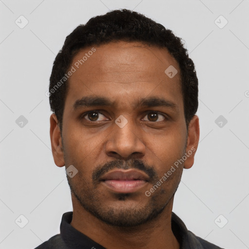 Neutral black young-adult male with short  black hair and brown eyes
