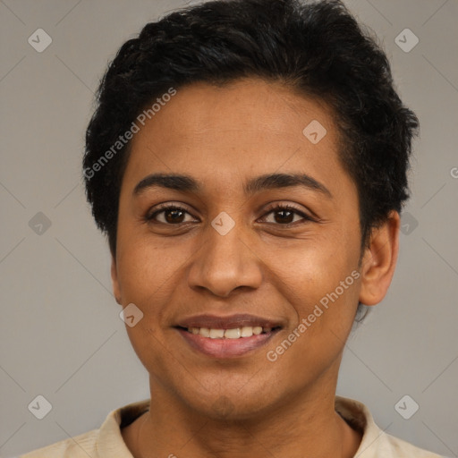 Joyful latino young-adult female with short  black hair and brown eyes