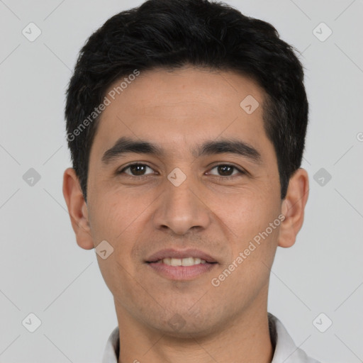 Joyful white young-adult male with short  black hair and brown eyes