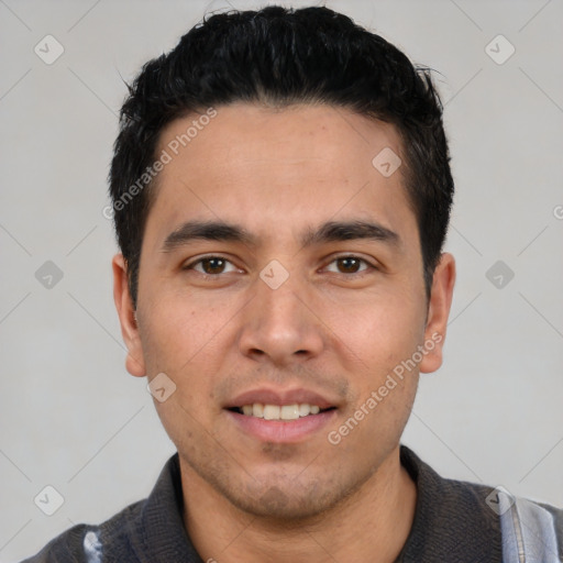 Joyful white young-adult male with short  black hair and brown eyes