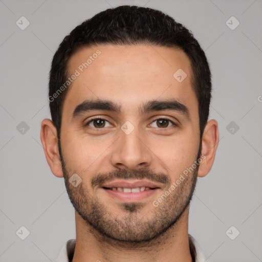 Joyful white young-adult male with short  black hair and brown eyes