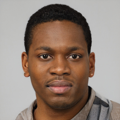 Neutral black young-adult male with short  black hair and brown eyes