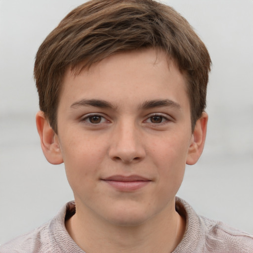 Joyful white child male with short  brown hair and grey eyes