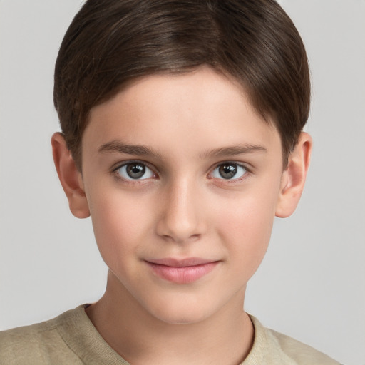 Joyful white child female with short  brown hair and brown eyes