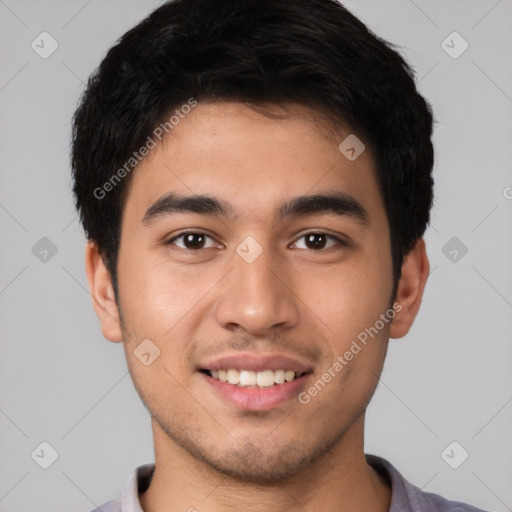 Joyful white young-adult male with short  black hair and brown eyes