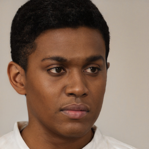 Neutral black young-adult male with short  brown hair and brown eyes